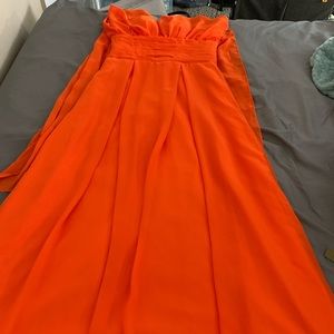 A brand new infinity orange bridesmaid dress.